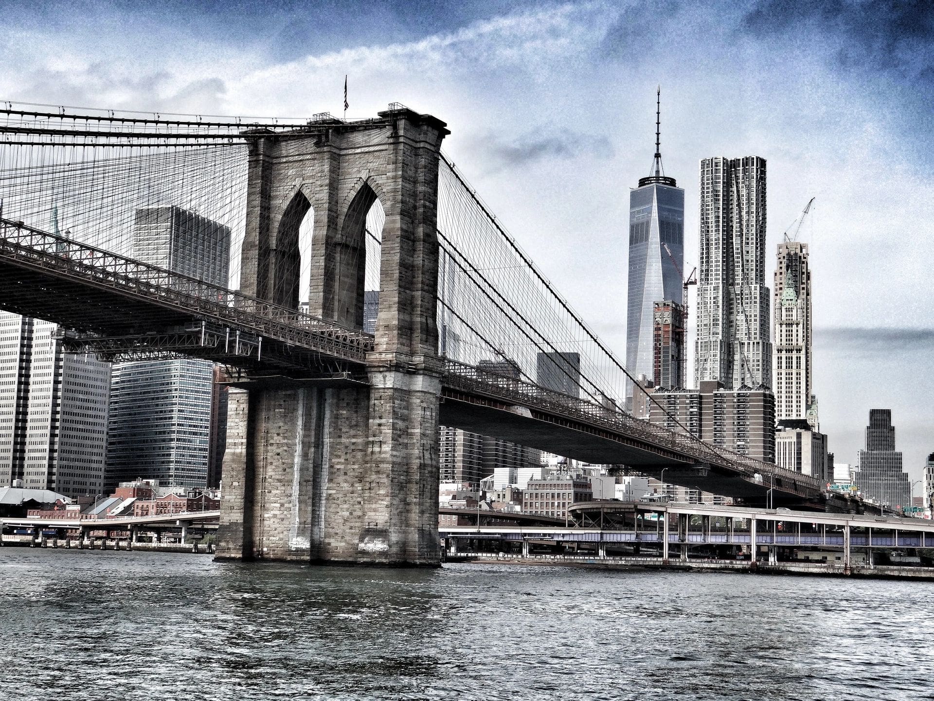 Brooklyn Bridge with NYC skyline.