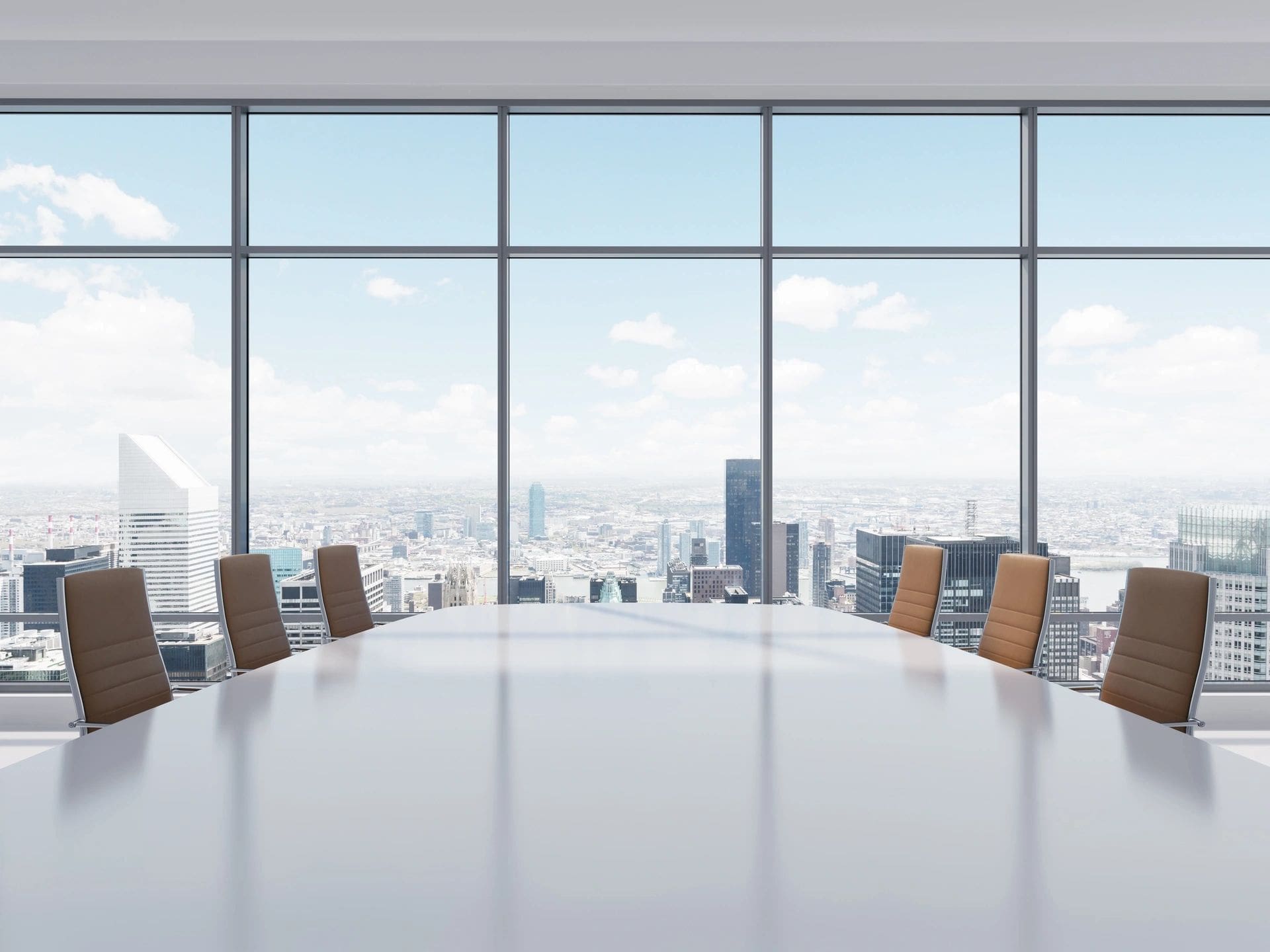 Empty conference room with city view.